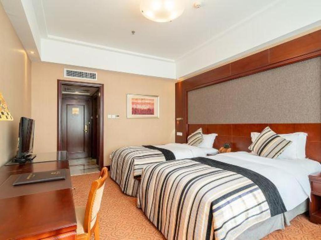 Yantai Golden Gulf Hotel Bagian luar foto