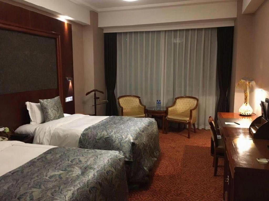 Yantai Golden Gulf Hotel Bagian luar foto